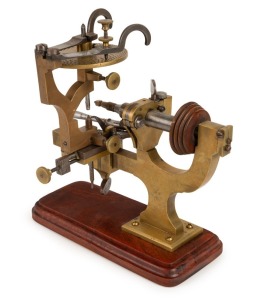 An attractive antique watchmaker's indexing lathe, 19th century, 26cm high, 26cm wide