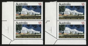 1977 18c Parliament House (SG.653) lower-left corner marginal pairs (2) each with "aberrant perfs" in left margins due to paper folds, both slightly different. (4).