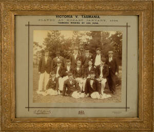 1898-99 VICTORIAN TEAM, team photograph with caption "Victoria v Tasmania, Played at Hobart January, 1899", framed & glazed, overall 49x42cm. Includes Warwick Armstrong & Frank Tarrant - both in their first First-Class match. Fair/Good condition.