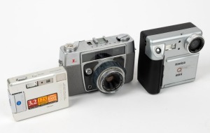 KONICA: Three cameras -&nbsp;one c. 1961 Konica L, one c. 1997 Konica Q Mini, and one Konica Minolta DiMage Xg.&nbsp;(3 cameras)