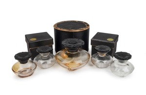 NARCISSE NOIR by CARON group of five vintage glass perfume bottles, three in original boxes, the largest bottle 5.5cm high, 7cm wide