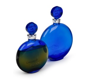 WORTH "SAN LA NUIT" group of two French blue glass eau de toilette bottles, both stamped "R. LALIQUE CREATION", 10.5cm and 9.5cm high