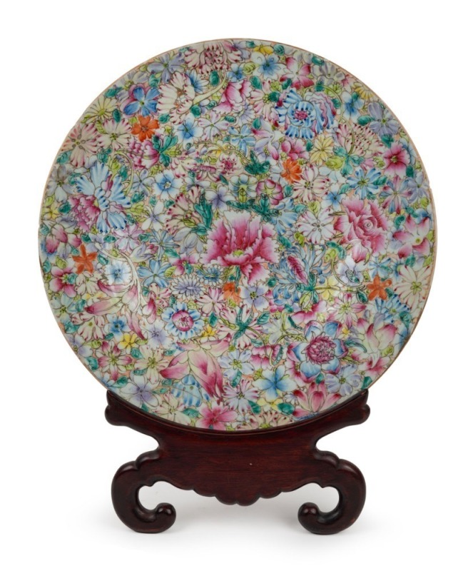 An antique Chinese famille rose porcelain charger, 19th century, ​​​​​​​four character iron red mark to base, 41cm diameter