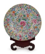 An antique Chinese famille rose porcelain charger, 19th century, ​​​​​​​four character iron red mark to base, 41cm diameter