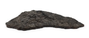 SUISEKI black Japanese landscape scholar's stone on carved timber base, 54cm wide overall