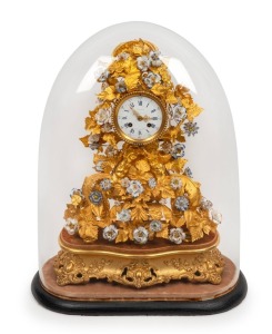 A stunning antique French mantle clock in glass dome, with floral porcelain and gold  leaf decoration, 8 day time and bell striking movement, 19th century, 55cm high.