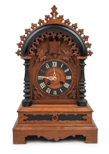 An antique Black Forest cuckoo table clock with time and strike movement, 19th century, 54cm high