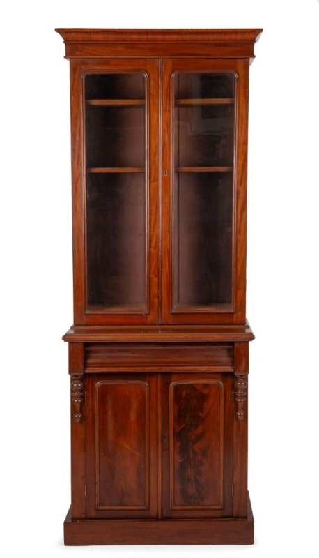 An Australian cedar two door bookcase, 19th century, 215cm high, 76cm wide, 39cm deep