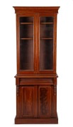 An Australian cedar two door bookcase, 19th century, 215cm high, 76cm wide, 39cm deep