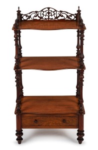 An antique English walnut three tier whatnot with pierced gallery, circa 1860, 107cm high, 56cm wide, 38cm deep