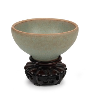 A fine antique Chinese celadon glazed bubble cup on later timber stand, Sung&nbsp;Dynasty, 10th/11th century, ​​​​​​​5cm high, 9cm diameter, 7.5cm high overall&nbsp;