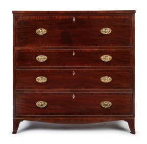 A Georgian mahogany secretaire chest of four drawers, with ivory escutcheon plates, shaped skirt and French feet, circa 1800, interior attractively fitted with drawers and compartments, ​​​​​​​110cm high, 115cm wide, 56cm deep