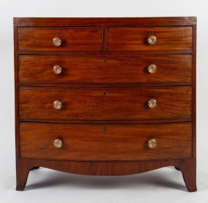 An antique Scottish bow fronted chest of four drawers with brass handles and French feet, circa 1810, ​​​​​​​102cm high, 104cm wide, 49cm deep