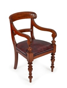 A fine Colonial Australian cedar library armchair with ornate carved back and hand rests, mid 19th century, 51cm across the arms