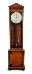 A fine quality antique English regulator with Graham's deadbeat escapement, jewelled pallets, maintaining power, trapezoidal beat adjustment to the crutch, and pivot capped screw adjustment to the back plate. Silvered dial with standard regulator dial layout, the seconds with astronomical five second markers, plus temperature compensated mercury pendulum with original brass cased weight. Dial signed "BROCKBANK & ATKINS, LONDON". Housed in later high quality floor standing glazed walnut case.