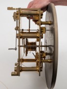 A fine quality antique English regulator with Graham's deadbeat escapement, jewelled pallets, maintaining power, trapezoidal beat adjustment to the crutch, and pivot capped screw adjustment to the back plate. Silvered dial with standard regulator dial lay - 6
