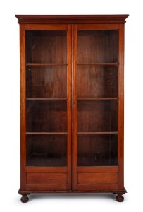 An antique Australian cedar two door glazed bookcase, New South Wales origin, 19th century, 222cm high, 130cm wide, 40cm deep