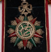 TUNISIA: THE ORDER OF GLORY, third class Commander's medal in original box of issue, bearing the monogram of Mohammed V Al Nasir 22nd Bey, (1906-1922), to the centre. - 2