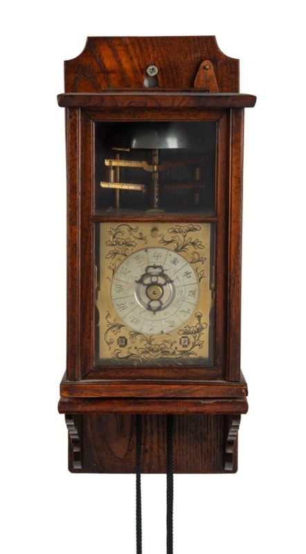 KAKE-DOKEI rare antique Japanese weight driven lantern wall clock in fine elm case, dual foliot balance with verge escapement and bell striking, circa 1840, the case 23cm high. PROVENANCE: Leonard Joel Auctions, Melbourne, 20th, November, 2011