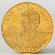 1979 150th Anniversary of the Swan River Colony - Western Australia, gold medal (27mm; 20.86g, 24ct) depicting Captain James Stirling with his ship in the background and on the reverse various representations of the products of Western Australia. - 2