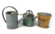 Two metal watering cans and a vintage metal bucket, early 20th century, the largest 41cm high