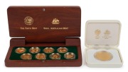 THE SYDNEY 2000 OLYMPIC $100 GOLD COIN collection of 8 coins in a gold-embossed Jarrah timber case; accompanied by the separately cased subscribers medallion. - 2