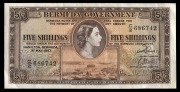 A small album containing CANADA 1900 25c banknote, G.B. 10/- & &pound;1 (4) QE2, Eastern Caribbean $5, BERMUDA 1957 5/-, Somalia 50/- and 100/-, Bank of Scotland &pound;1 and &pound;5, British Armed Forces &pound;1 (2nd Series), Falkland Islands &pound;5, Gibraltar &pound;1, Bahamas $3, St.