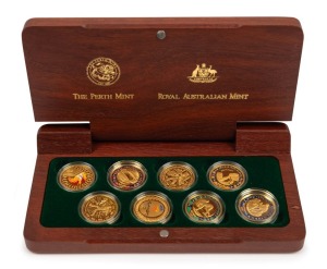 THE SYDNEY 2000 OLYMPIC $100 GOLD COIN collection of 8 coins in a gold-embossed Jarrah timber case; accompanied by the separately cased subscribers medallion.