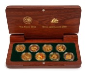 THE SYDNEY 2000 OLYMPIC $100 GOLD COIN collection of 8 coins in a gold-embossed Jarrah timber case; accompanied by the separately cased subscribers medallion.