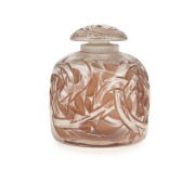LALIQUE "EPINES" French Art Deco glass vanity bottle with brown stained finish, circa 1920s, factory mark to base "R. LALIQUE", 8cm high