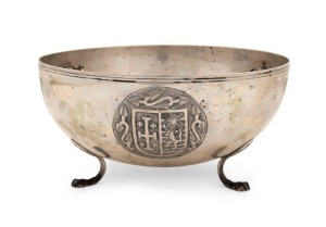 A Continental silver bowl with three repousse armorial vignettes, inscribed "To Commander J.C.R. PROUD From The Staff Of The C.B.S. December 1955", stamped "800, S.G.", 10cm high, 21cm diameter, 488 grams