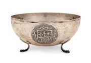 A Continental silver bowl with three repousse&nbsp;armorial vignettes, inscribed "To Commander J.C.R. PROUD From The Staff Of The C.B.S. December 1955", stamped "800, S.G.", 10cm high, 21cm diameter, 488 grams