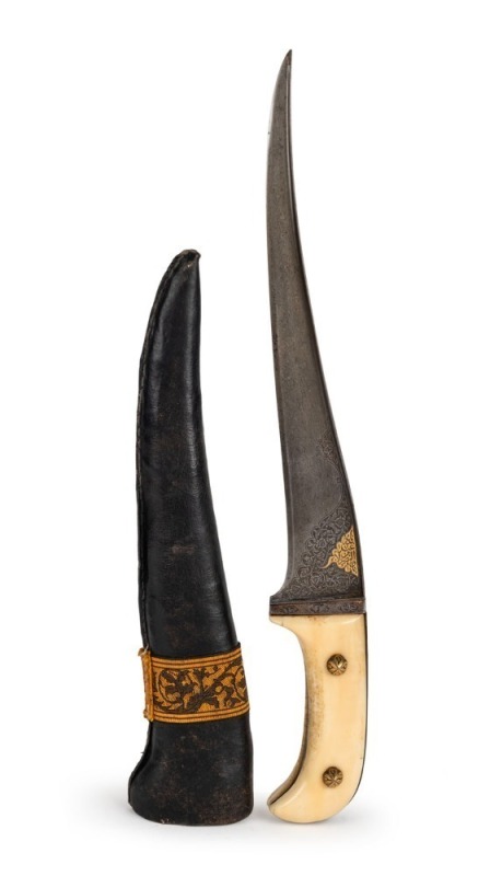 PERSIAN PESHKABZ: very good 9¾” single edged blade of Traditional form; excellent chisel engraving & gold inlay work to the riccaso; gold inlay Islamic inscriptions to back edge; vg walrus Ivory hilt slabs with Kinjal rivets; complete with original black