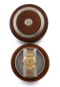 LONGINES "ADMIRAL" automatic wristwatch in yellow gold case with day/date window, baton numerals and gold plated bracelet band, in original timber box with two Longines&nbsp;gold plated buckles, 3.6cm wide including crown - 3