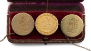Set of three antique 15ct gold livery badges, each made from a button and all engraved with griffin crests, 19th century, ​​​​​​​each 2.4cm diameter, 15.7 grams total