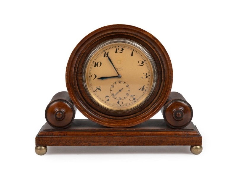 ZENITH Swiss mantle clock in fine walnut case with eight day movement, second subsidiary dial, Arabic numerals plus rare bezel wind and hand set mechanism, early 20th century, ​​​​​​​17cm high