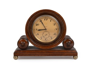 ZENITH Swiss mantle clock in fine walnut case with eight day movement, second subsidiary dial, Arabic numerals plus rare bezel wind and hand set mechanism, early 20th century, 17cm high