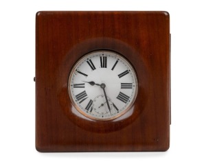 An antique English oversized pocket watch in silvered case with Roman numerals, housed in original mahogany travel case branded "Goldsmiths & Silversmiths Company Ltd.", 19th century, the case 14cm high overall