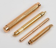Two antique travelling pencils, one stamped "TIFFANY & Co.", a rose gold needle case with needle and an antique pen casing stamped "15ct" by MORDAN & Co. (4 items)