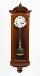 An antique Vienna regulator wall clock with time only single weight driven movement in walnut case, 19th century, 114cm high