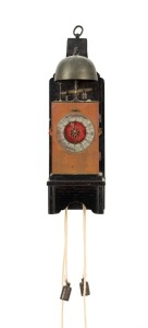 An early Japanese Kake-dokei two train weight driven, bell striking wall clock, with silk suspended verge pallets, circa 1690, 38cm high overall. PROVENANCE: purchased from Gerald E. Marsh Antique Clocks, Winchester U.K. in January, 2012