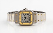 CARTIER "Tank" lady's automatic wristwatch in stainless steel case with gold highlights and sapphire crown, 2.5cm wide including crown
