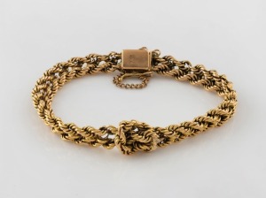 An 18ct yellow gold bracelet with ornate rope twist link, 22.3 grams