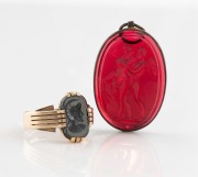 An antique 9ct yellow gold signet ring, set with intaglio cut stone with classical profile portrait; together with an intaglio cut red stone mounted as a pendant, 19th century, (two items), ​​​​​​​the ring 7.7 grams total