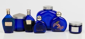 Seven assorted vintage French blue glass bottles and jars, 20th century, the largest 11cm high