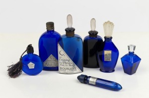 BOURJOIS group of seven assorted French blue glass perfume bottles, the largest 11cm high