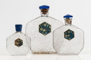 LE NARCISSE BLEU for MURY group of three graduated French glass perfume bottles, two with blue glass stoppers, the other with blue bakelite lid, the largest 18.5cm high