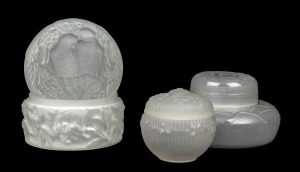 Three French Art Deco frosted glass lidded bowls, circa 1930, the largest 13cm diameter