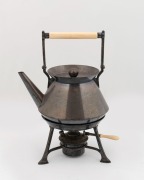 An English Arts & Crafts silver plated spirit kettle with ivory handles, in the manner of CHRISTOPHER DRESSER, late 19th century, stamped "ELSNER & CO.", ​​​​​​​27cm high