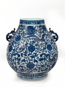 A large Chinese blue and white porcelain vase with dragon and lotus flower decoration, 20th century, ​​​​​​​39cm high, 32cm wide